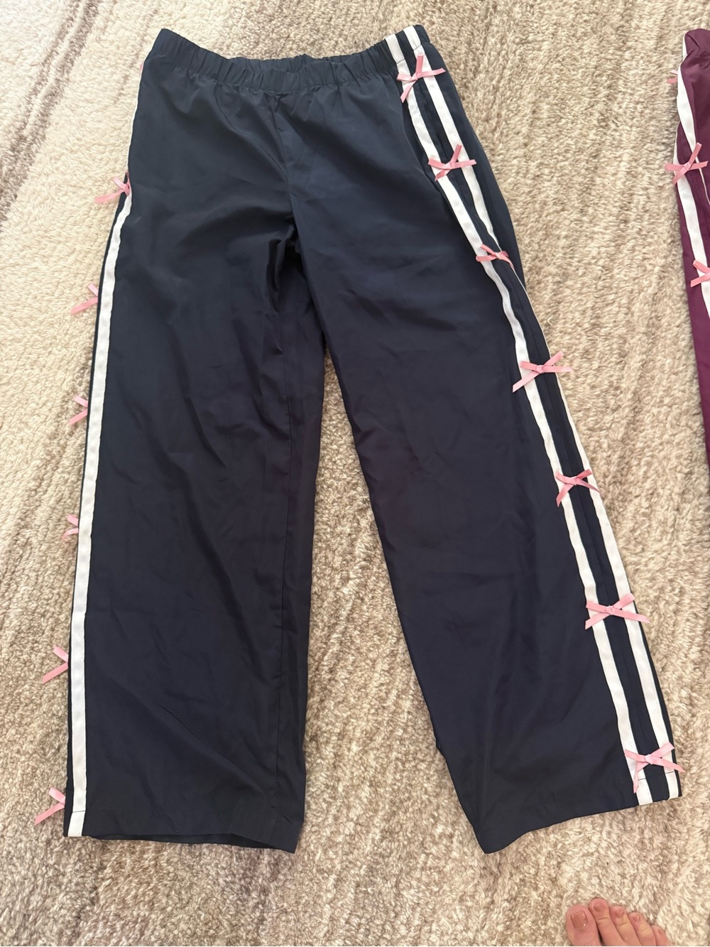 Edikted Navy Sweatpants with White Stripes & Pink Bows